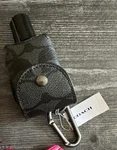 Nwt Coach Hand Sanitizer Holder Signature Canvas Black Charcoal Bag Charm C5593. Fixed Price $35.00.