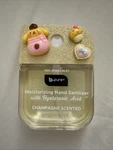 B .pure Hand Sanitizer Spray Champagne Glittery Top With Charms. Fixed Price $3.75.