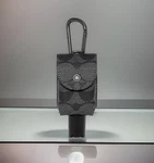 New Coach Signature Hand Sanitizer Holder Container Bag Charm Black C5593. Fixed Price $43.95.